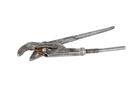 Old rusty adjustable wrench, isolated on white backgroundの写真素材