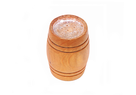 Wooden saltcellar, isolated on white backgroundの写真素材