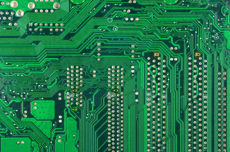 Close up of a printed green computer circuit board