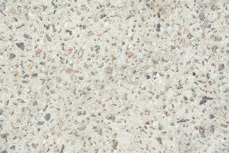 Abstract grey stone background with gravel partの写真素材