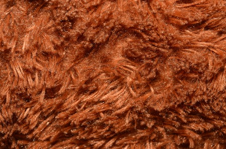 Close up of brown synthetical fur textured backgroundの写真素材