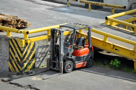 Red forklift truck, machine for loading freightの写真素材