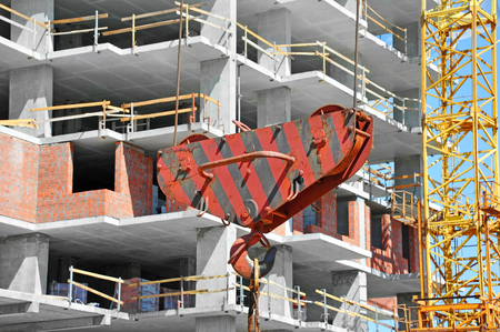 Building construction site work and crane winchの写真素材