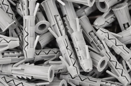 Some new gray plastic dowel, close up
