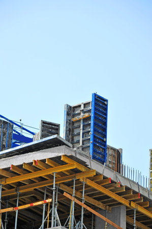 Building construction site work against blue sky