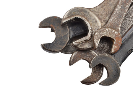 Old rusty wrench, isolated on white backgroundの写真素材