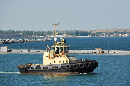 Tugboat in harbor quayside of Odessa, Ukraineの写真素材
