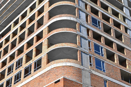 Building construction site work from concrete and brick