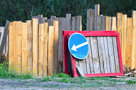 Sign and fence on road construction workの写真素材