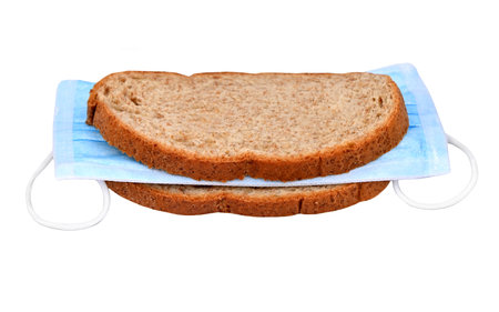 Surgical mask in sandwich â€“ medical waste theme