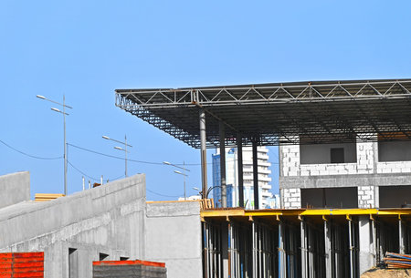 High-rise building construction site work with scaffolding