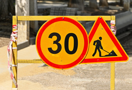 Sign and fence on road construction work