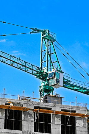 New building construction site work with tower cranesの写真素材