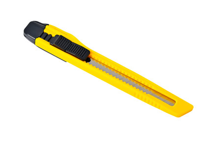 Yellow paper knife, isolated on white background