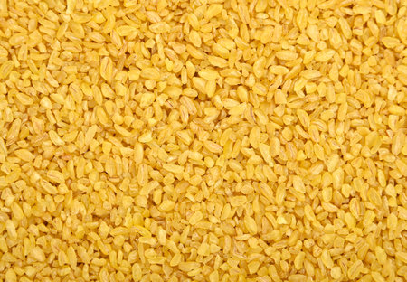 Bulgur grain, close up as natural backgroundの写真素材