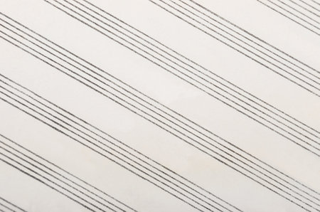 Old musical book for notes, close up as background