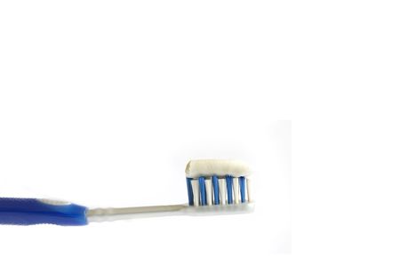 Blue Toothbrush with paste, isolated on white backgroundの写真素材