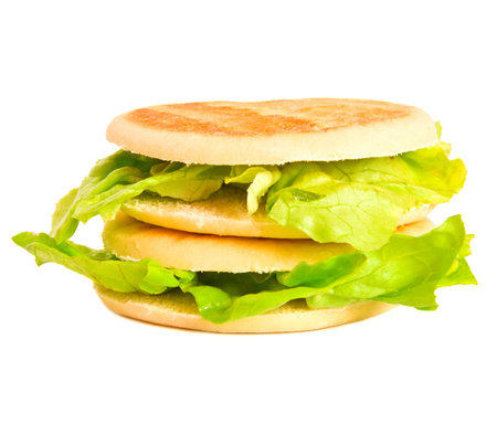 Healthy sandwich filled with vegetables, isolated on white backgroundの写真素材
