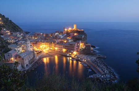 Aerial view of Vernazza fishing village in Italy at duskの写真素材