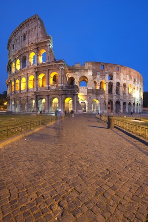 The famous Colosseum (or Coliseum) in Rome, Italy at duskの写真素材