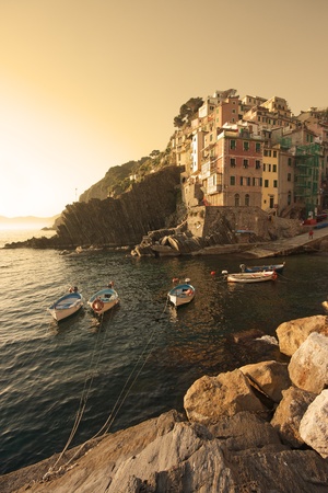 boats on the sea in riomaggiore, liguria, italyの写真素材