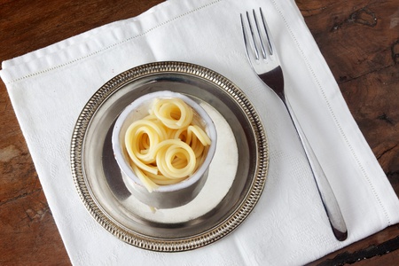 spaghetti pasta in a very small bowlの写真素材