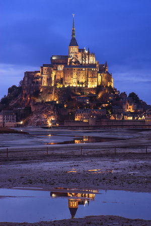 Mont Saint Michel (Saint Michael's Mount) at dusk in Normandy, France.のeditorial素材