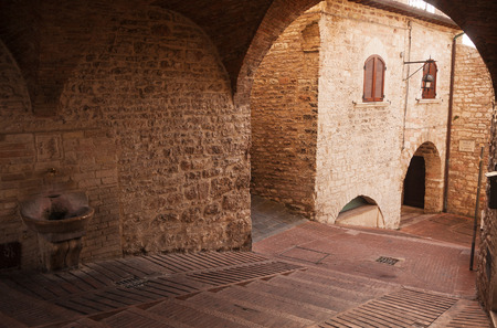 Ancient medieval alley in Assisi, Italy.のeditorial素材