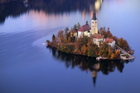 Bled Lake (Slovenia). The small island and its church seen from above at dusk during autumn.のeditorial素材
