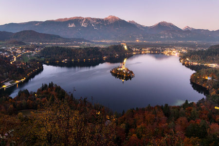 Aerial view of beautiful Bled Lake, Slovenia, at dusk. Mountains on background.の写真素材