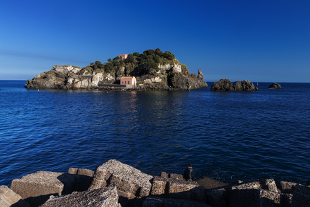 Sicily, Italy: beautiful Lachea Island in Aci Trezza (near Catania) during a sunny summer day.の写真素材