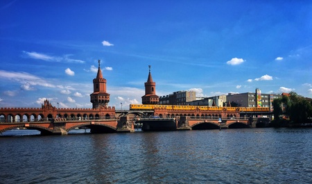 Famous oberbaumbruecke bridge with subway on a sunny day in Berlin, Germanyの素材