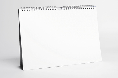 white blank calendar mockup with spiral bindingの写真素材