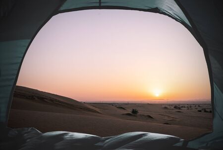 view out of a tent situated in the desert, tourism conceptの写真素材