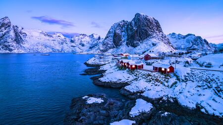 Norwegian fishermen's cabins, rorbuer, in the village of HamnÃ¸y, Reine on the Lofoten in northern Norwayの写真素材