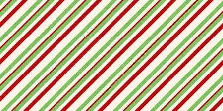 Red and green vintage rough kraft textured seamless diagonal candy cane stripes Christmas decoration pattern. Classic xmas card background or gift wrap, wrapping paper or, winter holiday backdropの写真素材