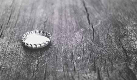 crown cap beer (or Crown cork beer) 1 piece placed on wooden floorの写真素材
