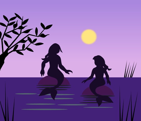 Two mermaids sitting and talking in the moonlight.の写真素材