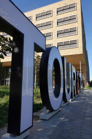 Brussels , Brabant, Belgium 09 06 2023 Vertical closeup the Herman Teirlinck building of the Flemish government on environment at Tour and Taxis against a sunny skyのeditorial素材