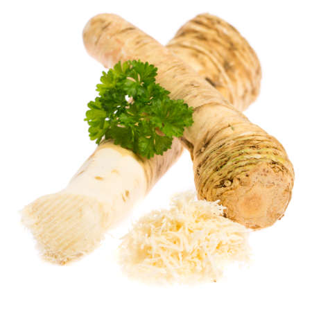 Two roots of horse radish isolated on white backgroundの写真素材