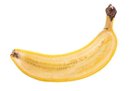 lengthwise cutted halfed yellow banana fruit with peel isolated on white background. Real edible fruit and vegetable. Cutted to half or slices isolated on white background,の写真素材