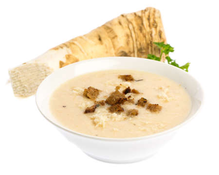 Horseradish soup with horseradish isolated on white backgroundの写真素材