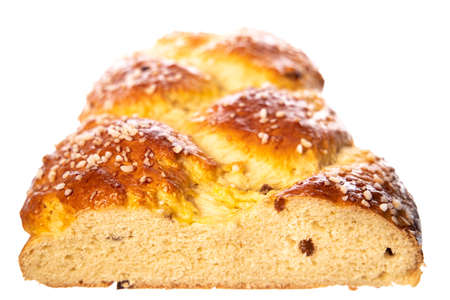 Typical traditional Austria:  half cutted fresh Oster / Allerheiligen Striezel with raising isolated on white backgroundの写真素材