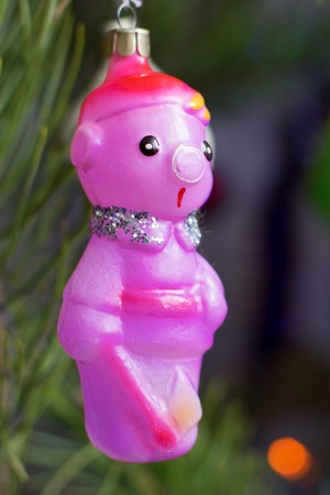 Strange vintage christmas tree toy woodcutter of glass at night closeup colorfulの写真素材