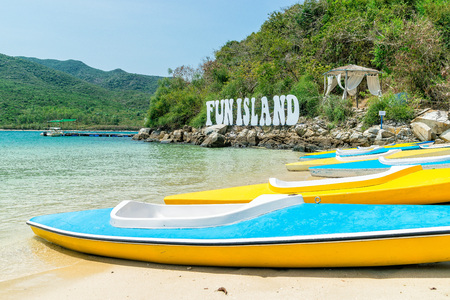 Paradise beach on island with colorful kayayks on shore in Vietnamの写真素材