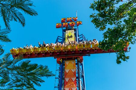 NHA TRANG, VIETNAM - APRIL 16, 2019: Screaming people at attraction in amusement park Vimpearl in Nha Trang in Vietnamのeditorial素材