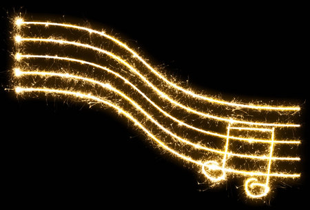 Music made of sparkler. isolated on a black background
