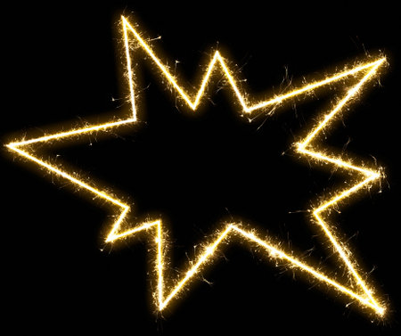 Explosion frame made by sparkler. isolated on a black backgroundの写真素材