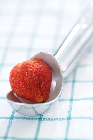 strawberry on spoonの写真素材