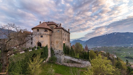 Panorama of Castle Schenna (Scena) near Meran during sunset. Schenna, Province Bolzano, South Tyrol, Italy.のeditorial素材